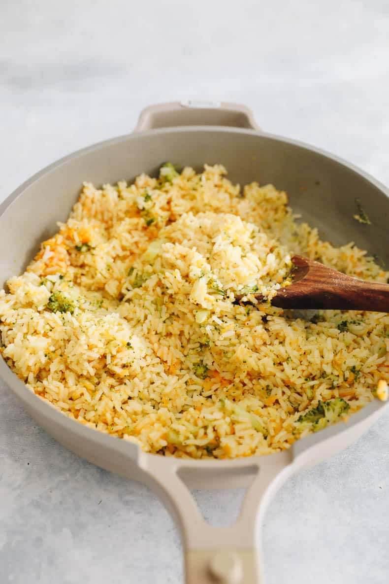 Cooked rice with veggies in a non-stick pan