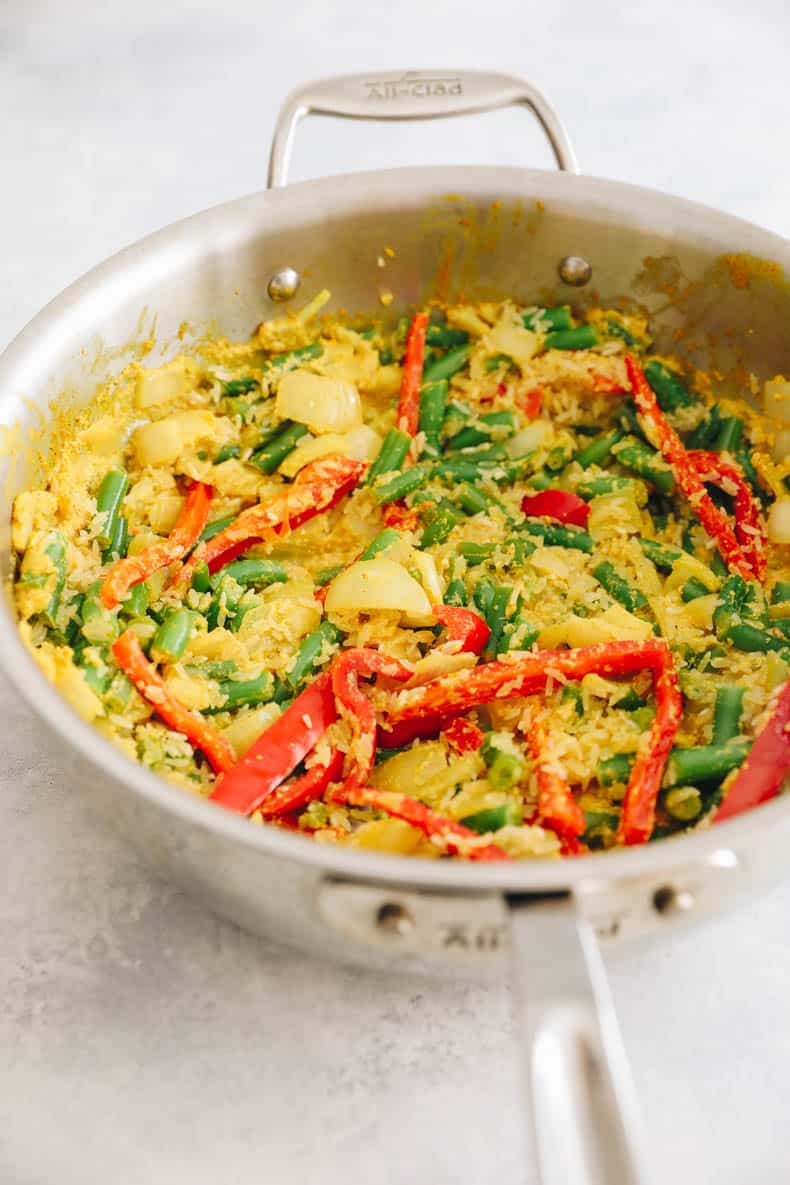 one-pot tandoori chicken and rice in an all-clad pot