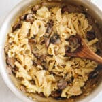 mushroom stroganoff cooked and mixed in a large pan.