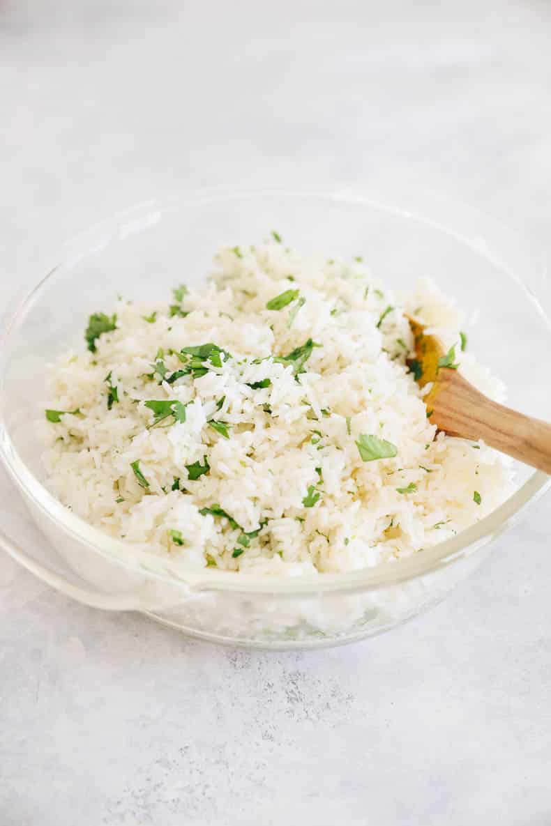 cilantro lime rice in a clear bowl