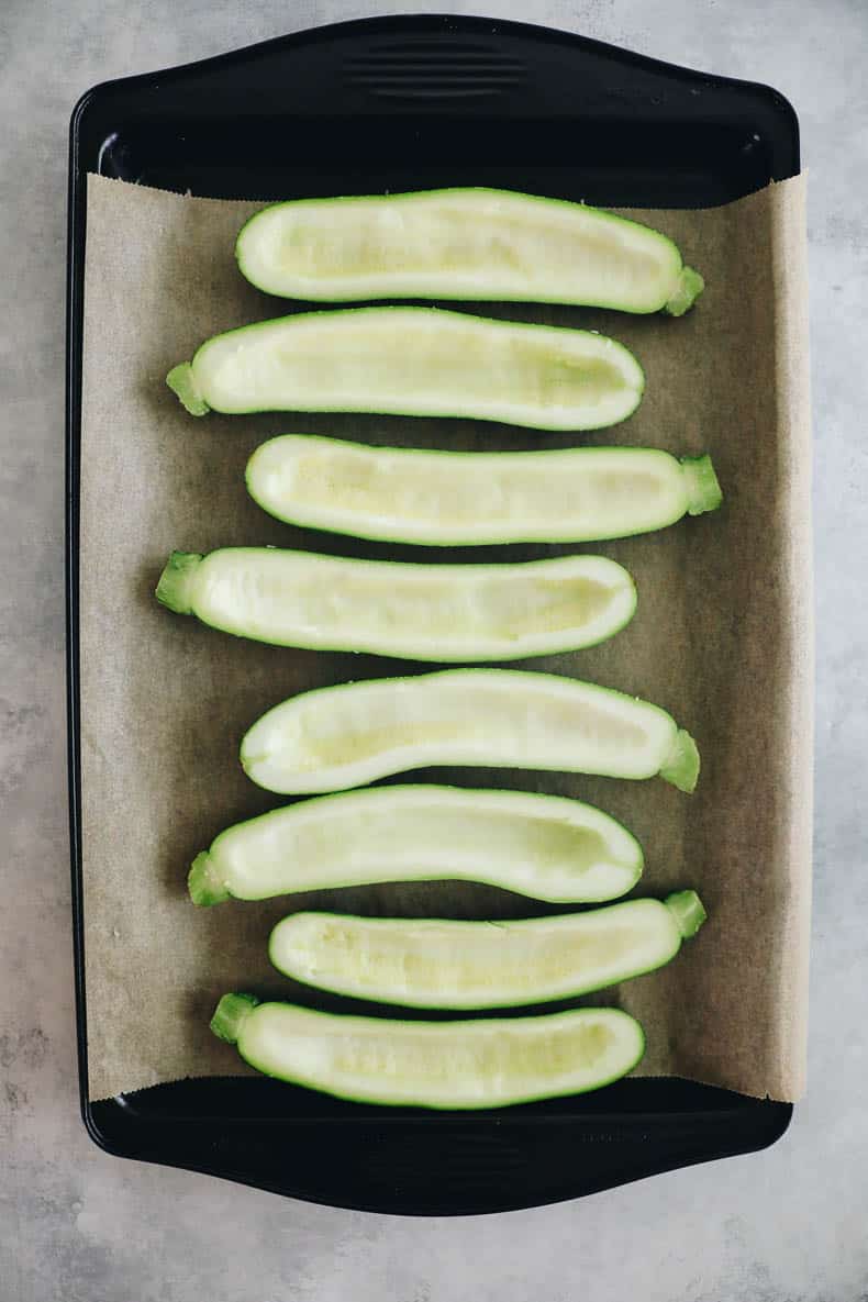 zucchini wells on a baking sheet